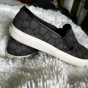 Used Coach slip on in black